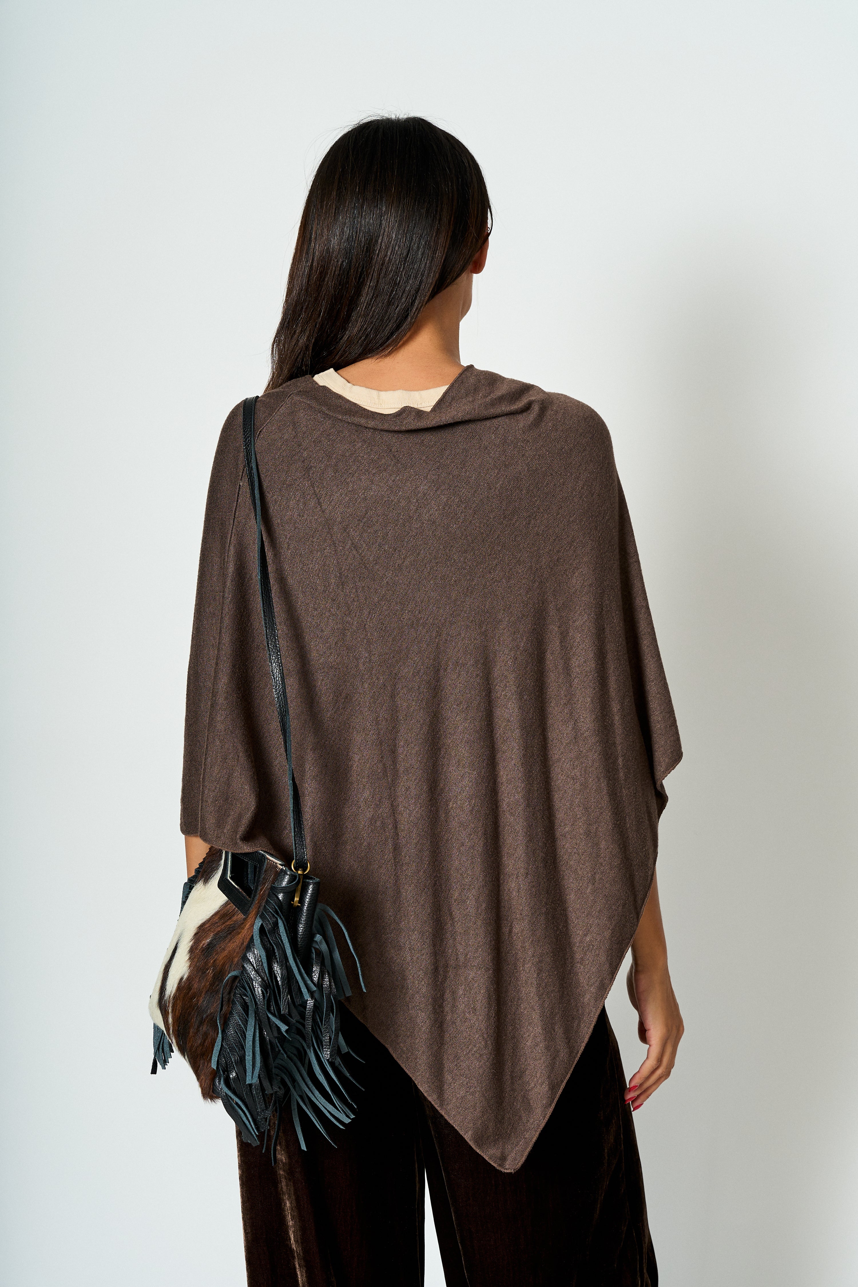 Poncho Aura