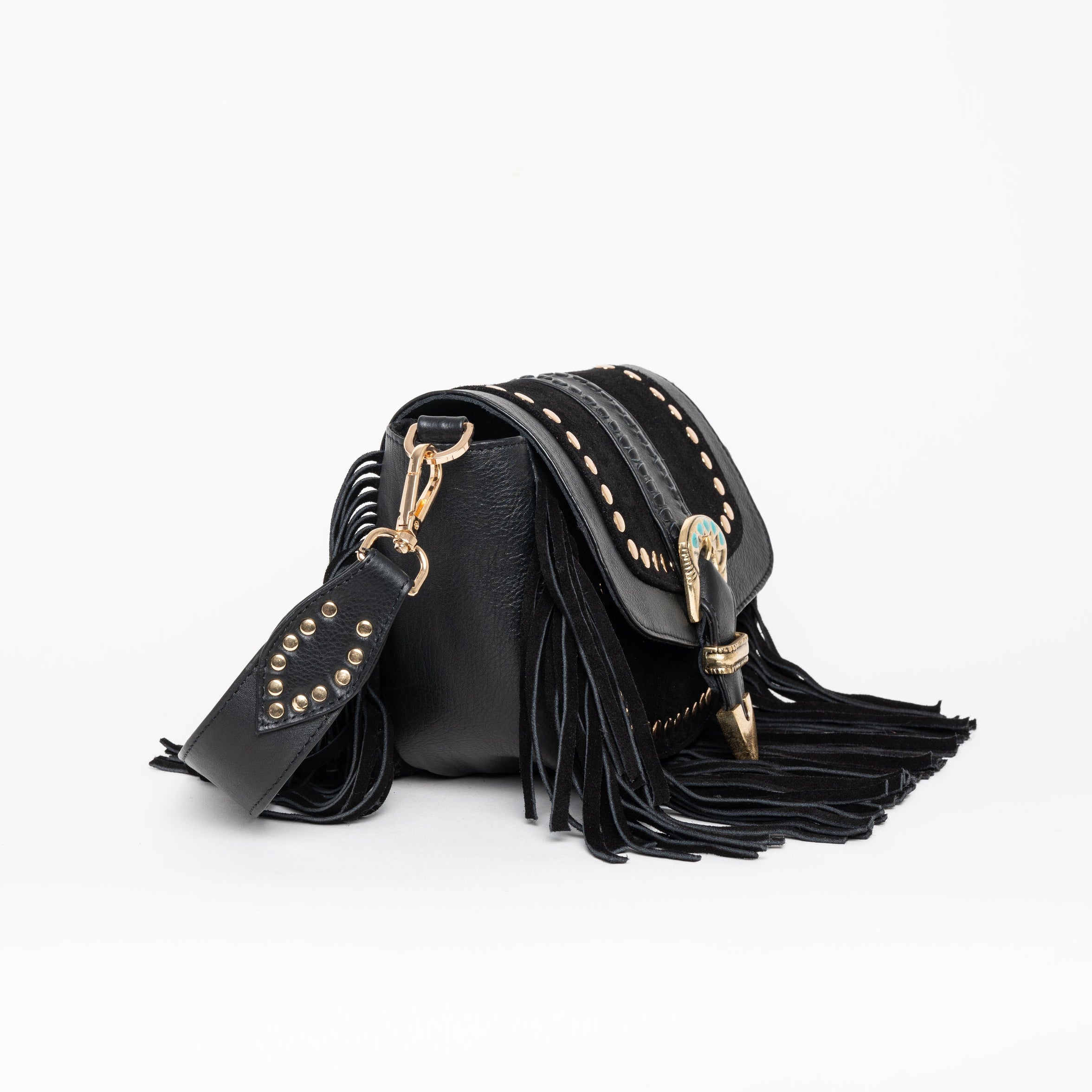 Cartera de cuero Elena con flecos y herrajes.