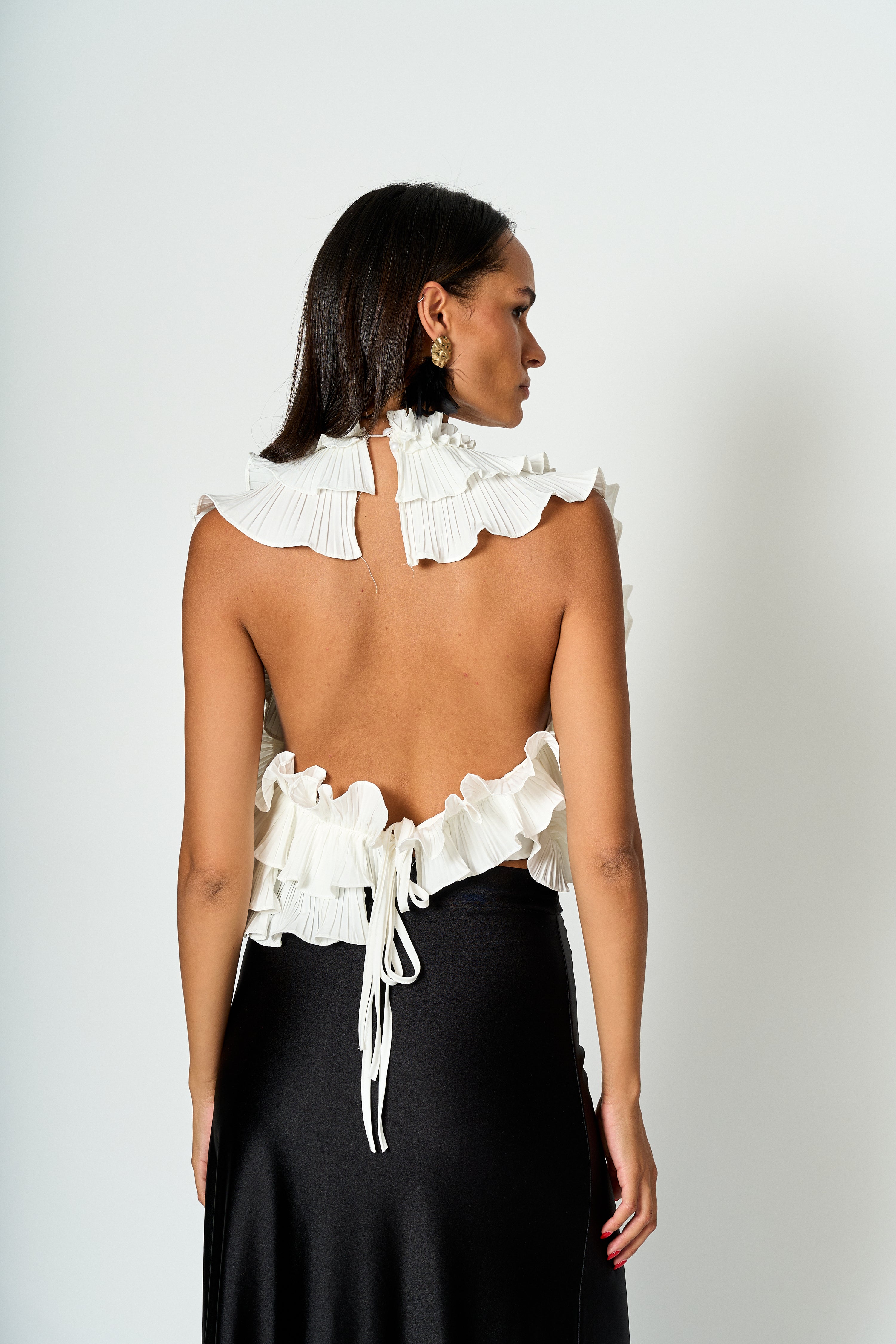 Blusa Candelaria sin manga con vuelos