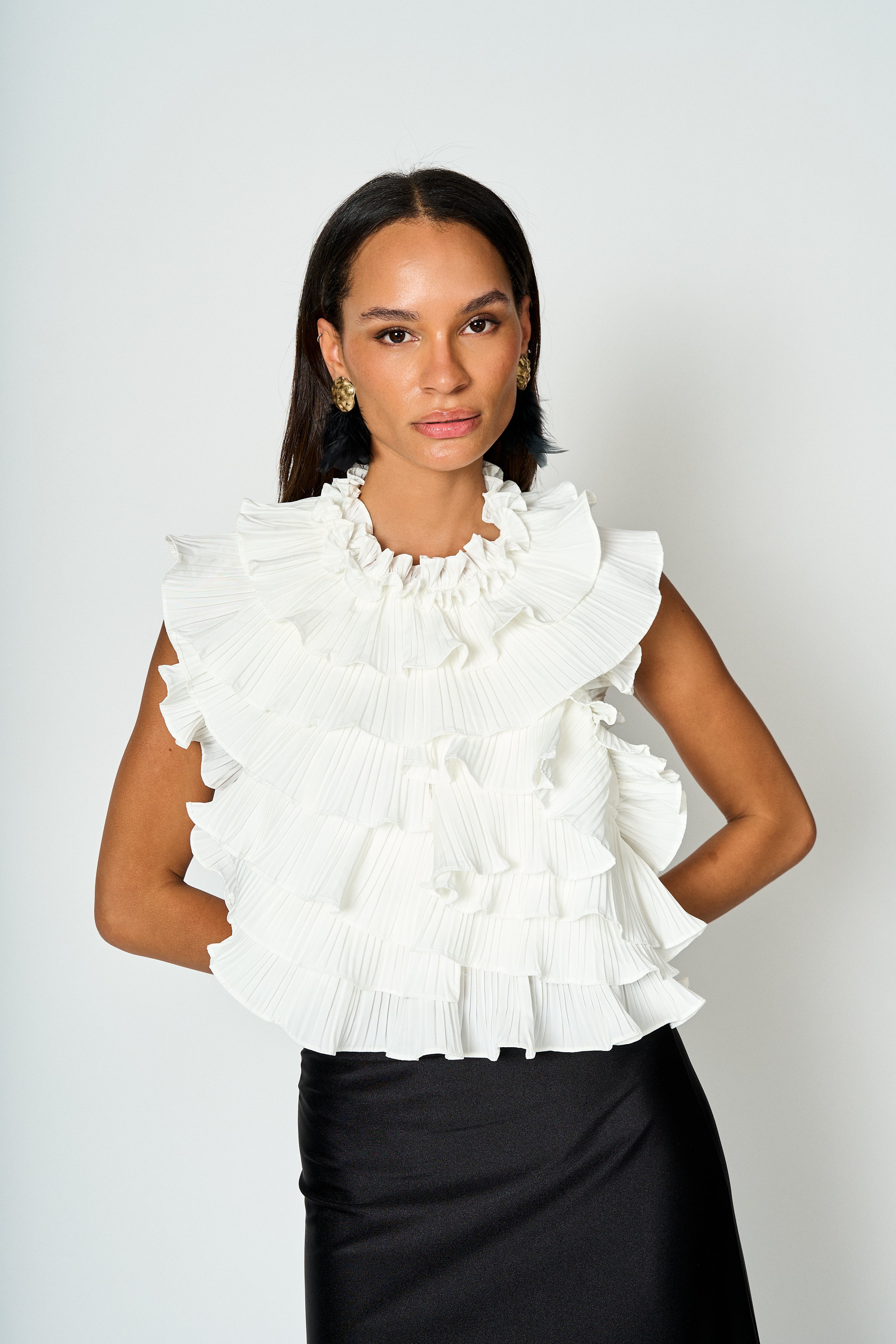 Blusa Candelaria sin manga con vuelos
